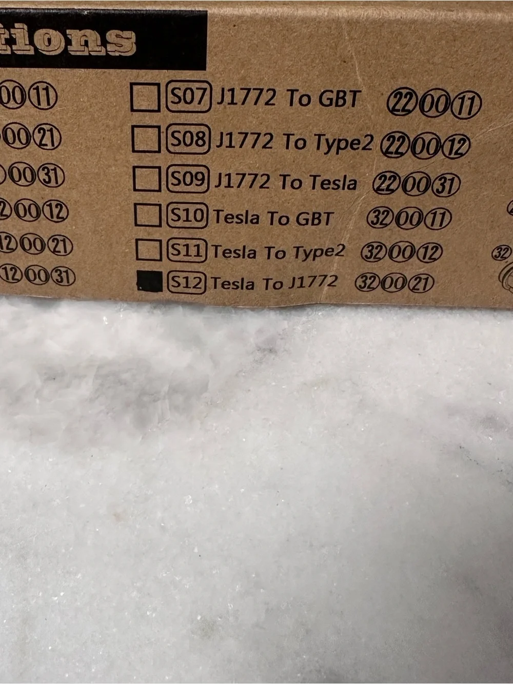 Source Unknown White and Black EV Charging Adapter Connector